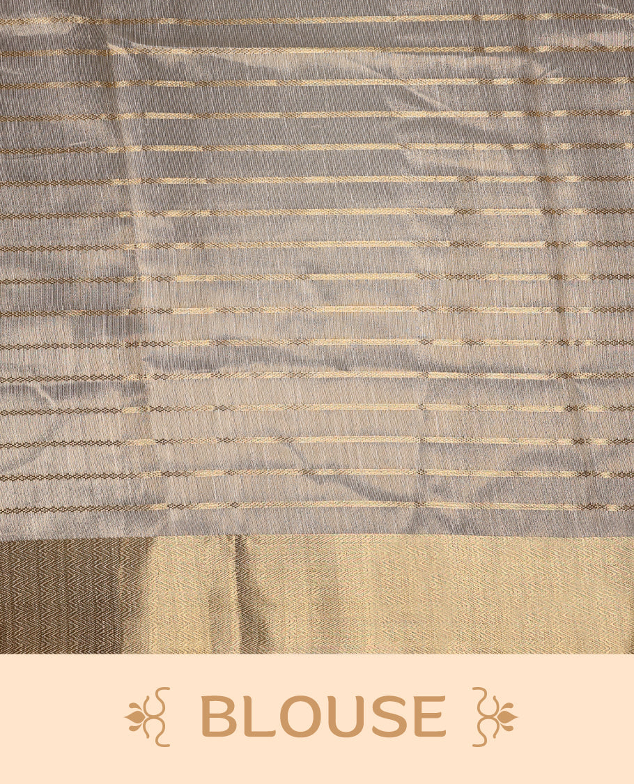 White & gold colour Organza Kerala saree featuring a smooth body with Gold zari Stripes, highlighted by a sleek golden zari border, Bold pallu Paired with a matching blouse.