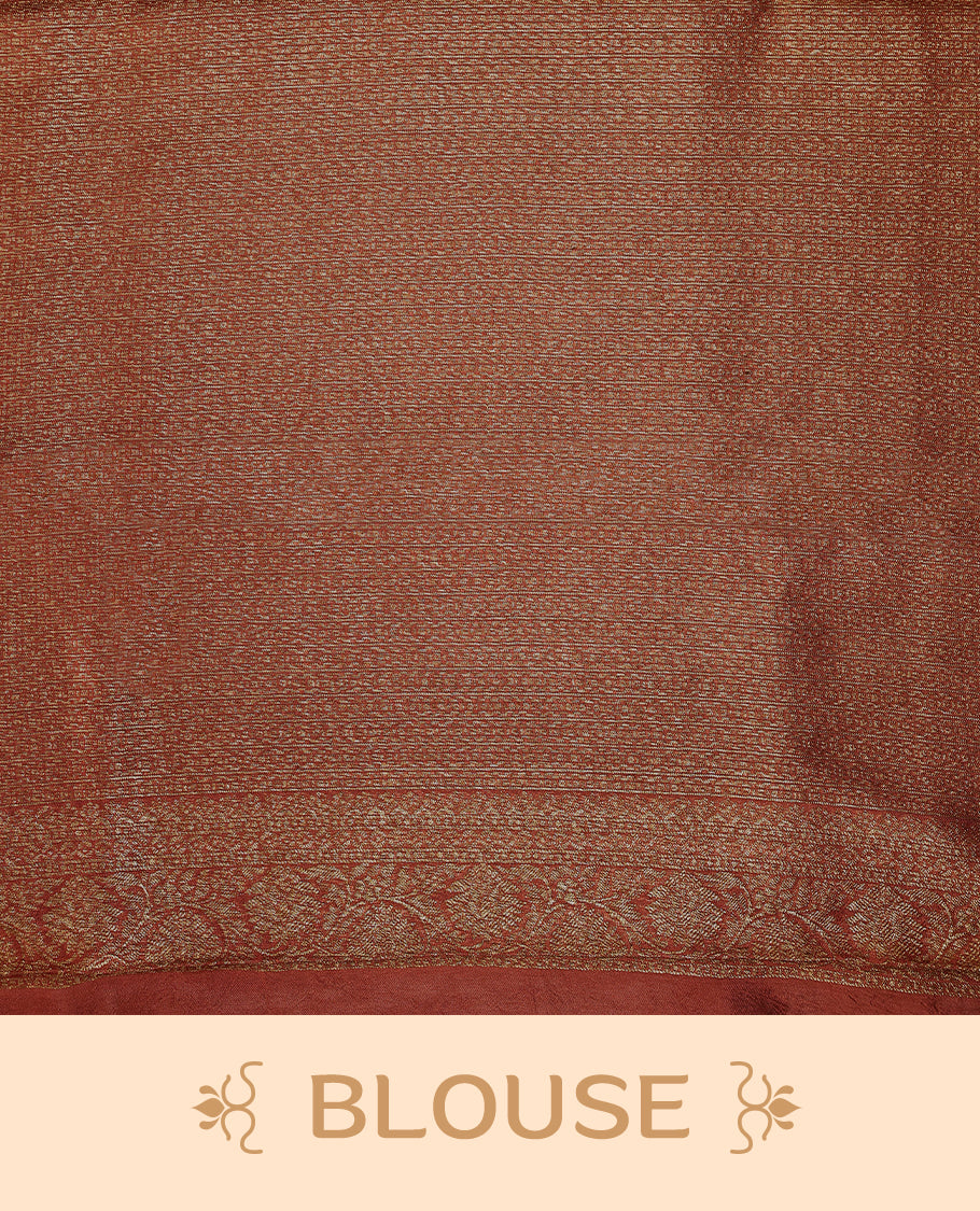 Rust Orange semi-Banaras tussar georgette saree embellished with antique zari motifs across the body, complemented by a rich heritage Banaras border and paired with a matching blouse.