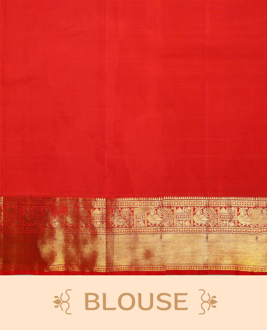 Chilly red colour pure Kancheepuram saree with gold zari Mayoora Chakra motifs on the body, traditional border with peacock and diagonal line patterns, grand pallu with Chathurakamalam and Thilakam, paired with matching blouse.