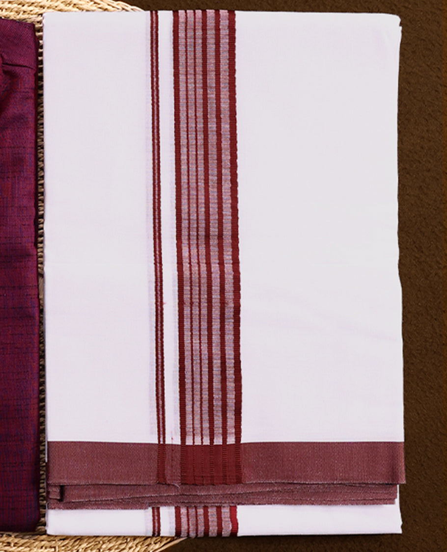 RAMRAJ maroon kurtha paired with a white dhoti, elegantly finished with a matching maroon border.