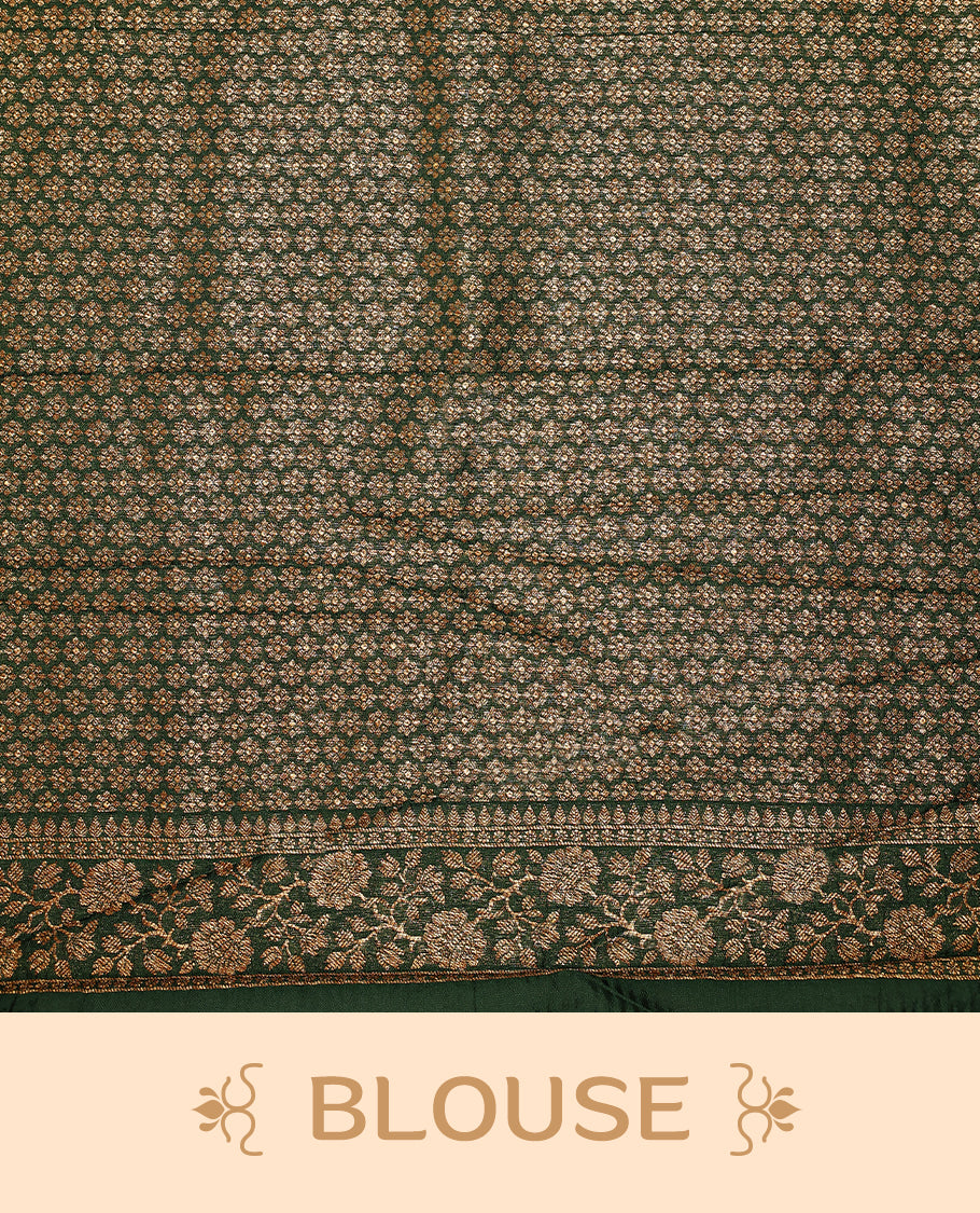 Bottle Green colour Tussar Banaras saree featuring a plain body, rich floral woven zari border and grand pallu, paired with a matching blouse for an elegant and regal traditional look.