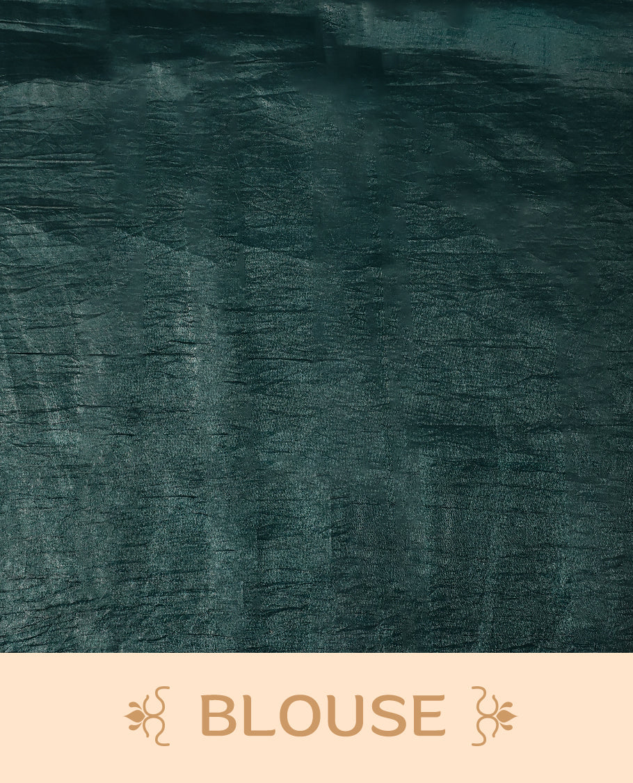 Deep Sea Green Colour crush soft silk saree, textured body with a natural crinkled finish, adorned with intricate Silver colored floral Motifs and complemented by a delicate Silver Zari embroidery border, paired with a matching blouse