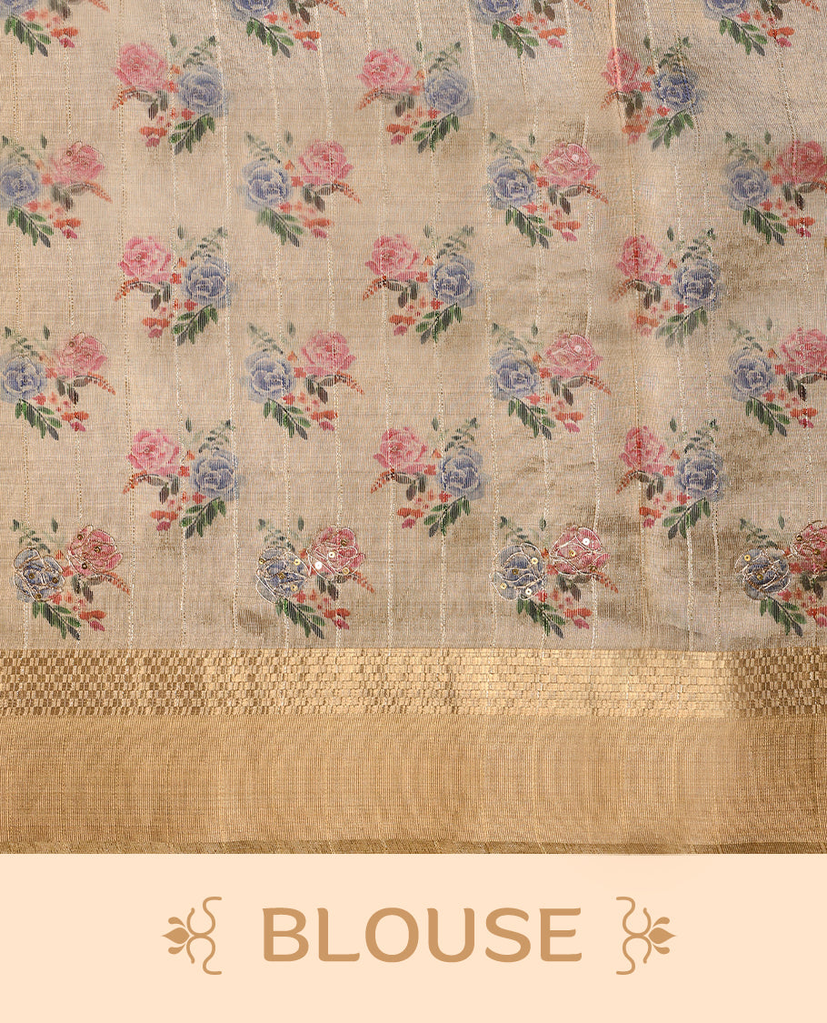 Light gold colour organza Kerala saree featuring subtle checkered weave with zari detailing on the border and pallu, highlighted with delicate floral accents near the pleats, paired with a matching blouse.