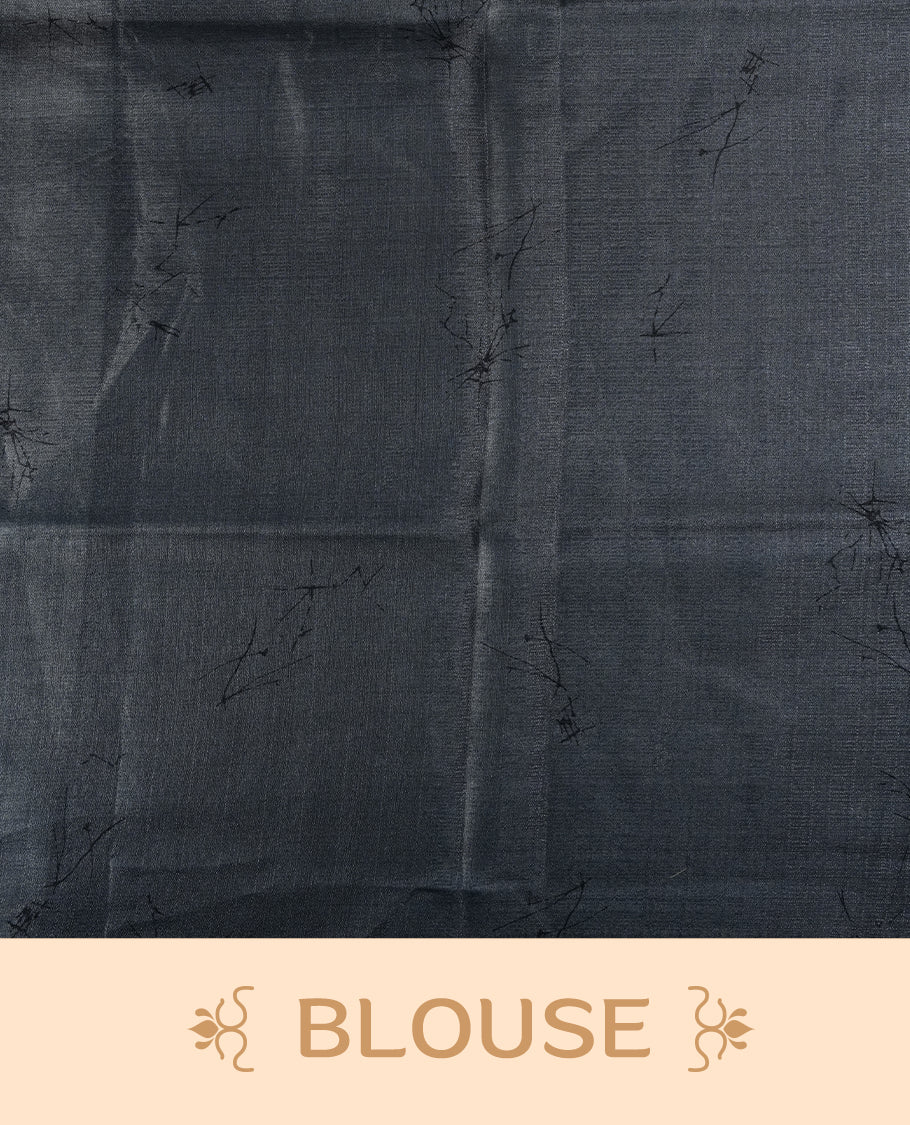 Grey and off white colour saree featuring bold floral and abstract prints across the body and pallu, offering a perfect blend of elegance and modern style, paired with a matching blouse piece.