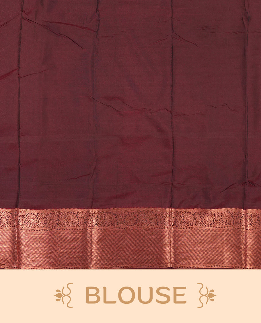 Black colour Semi Silk Saree with copper zari checkered on the body, paired with a contrast chocolate brown colour pallu with coppper zari traditioal border, and a matching blouse piece.