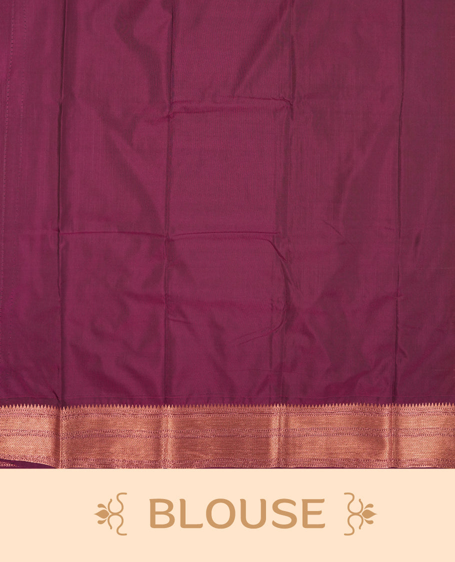 Dusty Rose colour Semi Silk Saree with copper zari motifs on the body, paired with a contrast Dark purple colour pallu with copper zari traditioal border, and a matching blouse piece.