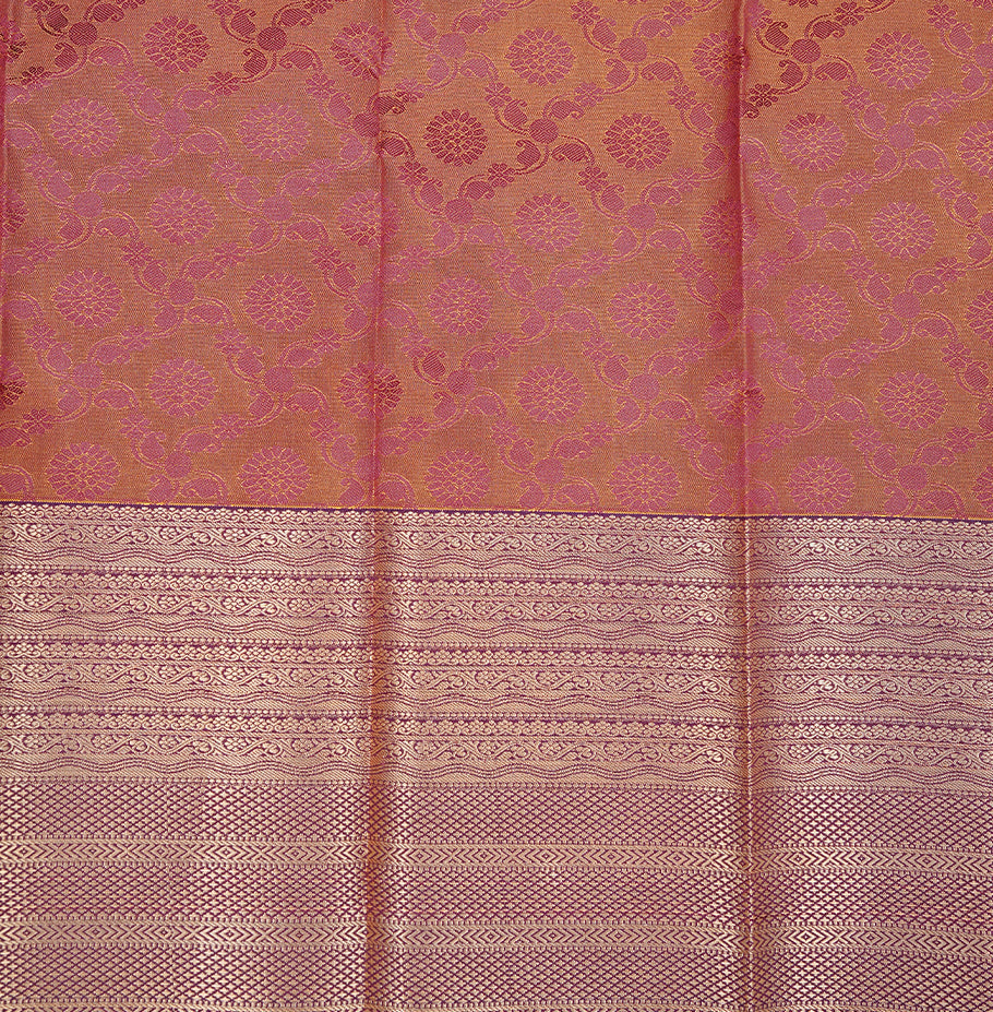 Maroon & gold colour Semi silk saree Featuring self colour zari motifs on body, complemented by contrast burgundy colour with gold zari border, paired with matching blouse piece.