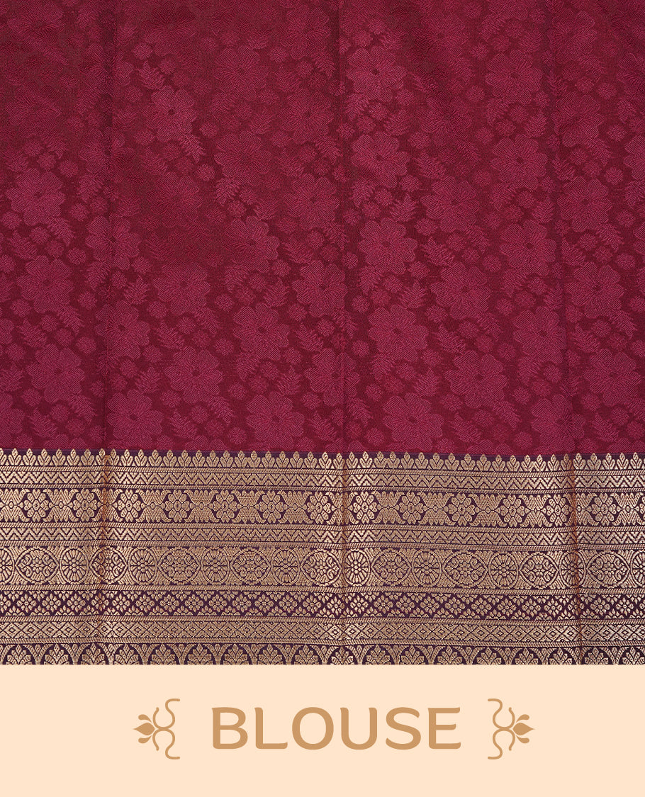 Maroon colour Semi silk saree Featuring selfcolour zari motifs on body, complemented by contrast Green colour with gold zari border, paired with matching blouse piece.