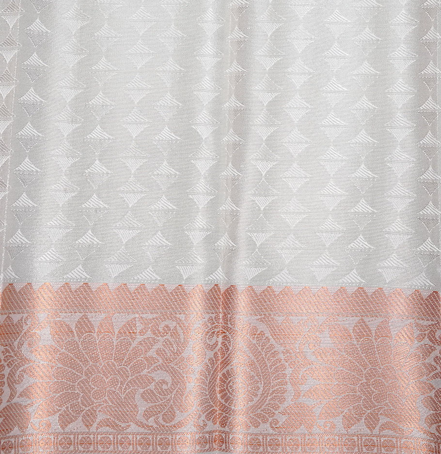 Silver colour Semi silk saree Featuring Cream colour patterns on body, complemented by Self colour with Antique zari border, paired with matching blouse piece.