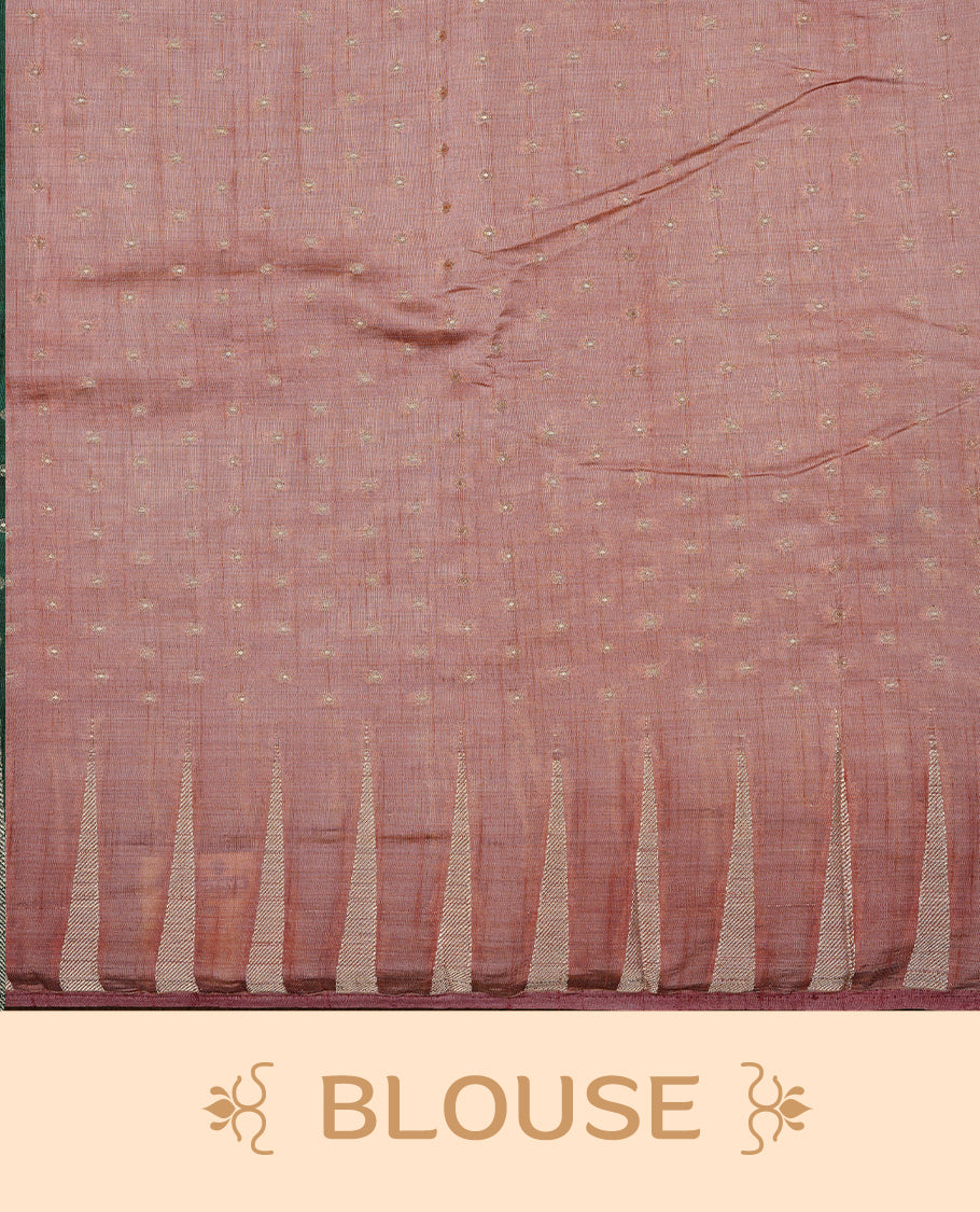 Dusty Rose colour semi tussar silk saree featuring gold zari dot motifs all over the body, highlighted by a self colour border with intricate gold zari temple patterns. Comes paired with a matching blouse piece.