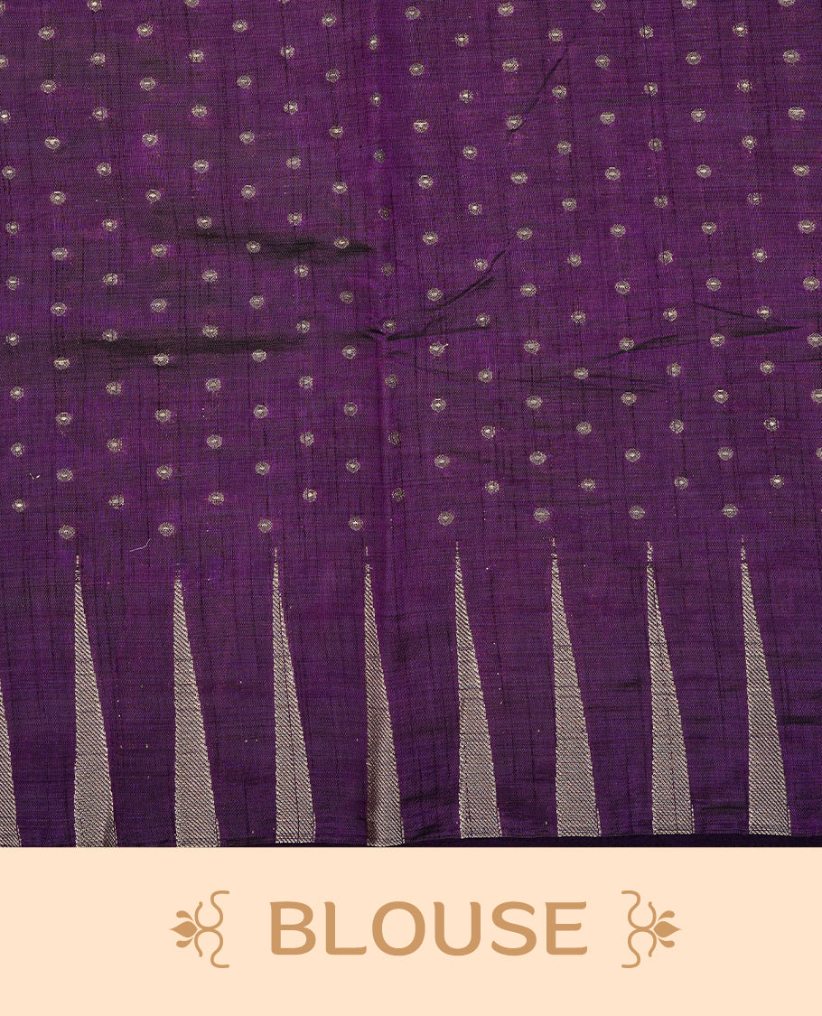 Purple colour semi tussar silk saree featuring gold zari dot motifs all over the body, highlighted by a self colour border with intricate gold zari temple patterns. Comes paired with a matching blouse piece.