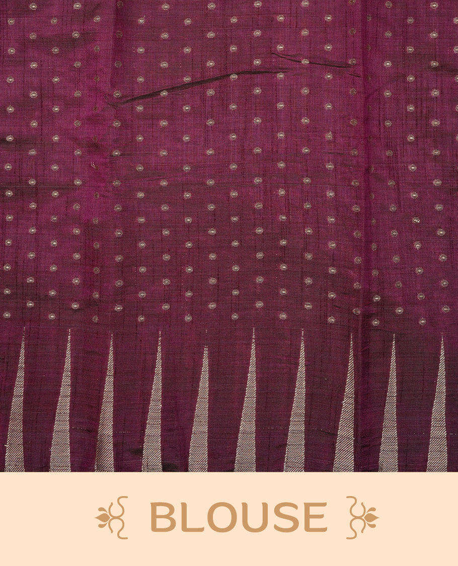 Chocolate colour semi tussar silk saree featuring gold zari dot motifs all over the body, highlighted by a self colour border with intricate gold zari temple patterns. Comes paired with a matching blouse piece.