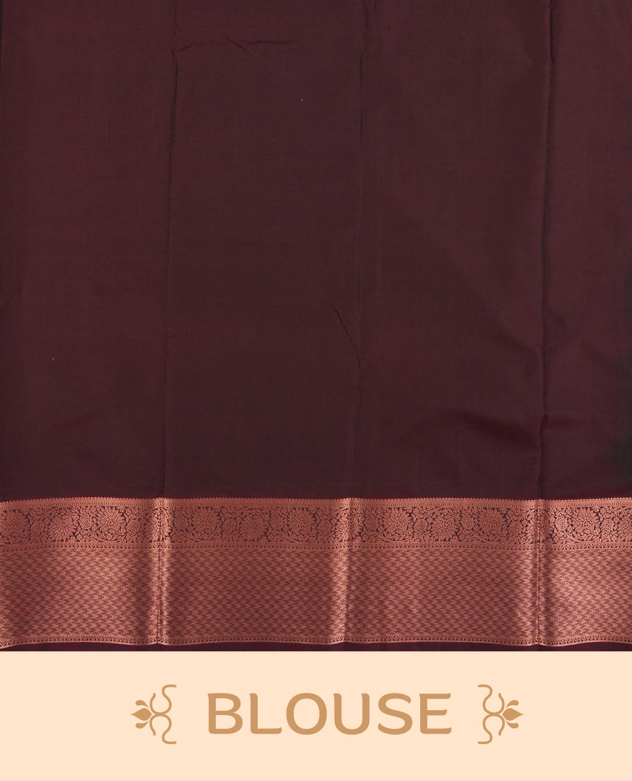 Dark green colour Semi Silk Saree with gold zari stripes on the body, paired with a contrast Burnt maroon colour pallu with gold zari traditioal border, and a matching blouse piece.