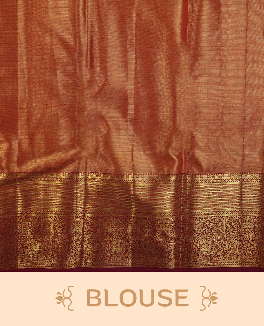 Red & gold double shade colour kancheepuram tissue silk saree highlighting gold stripped zari pattern body, with contrast burgundy colour colour with traditional border and paired with matching blouse.
