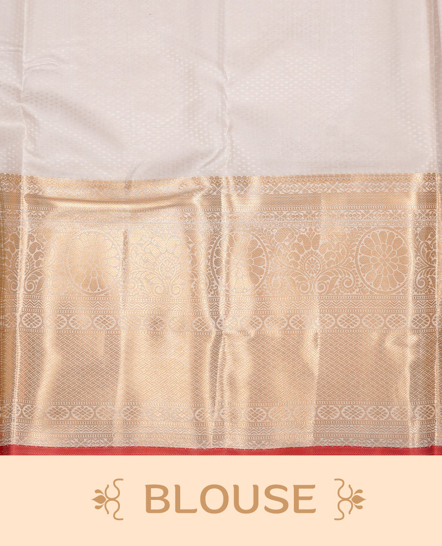 White Semi Wedding Silk Saree featuring Gold Zari Check with Motifs On body, Complemented with traditional zari with Self colour border with red piping, paired with matching blouse piece.