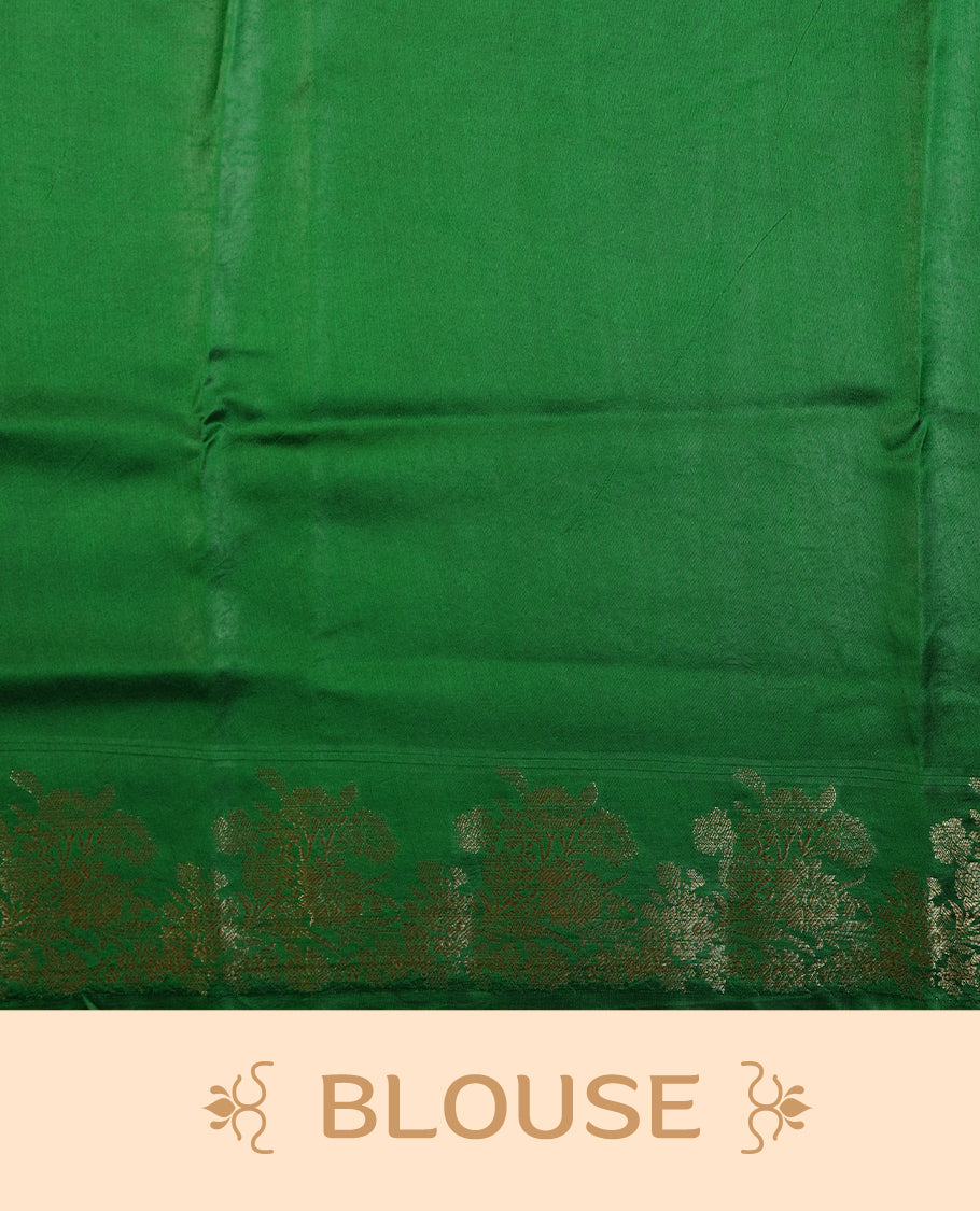Yellow colour pure tussar Banarasi saree featuring Gold zari motifs on body, self colour border, and a contrast green colour blouse piece.