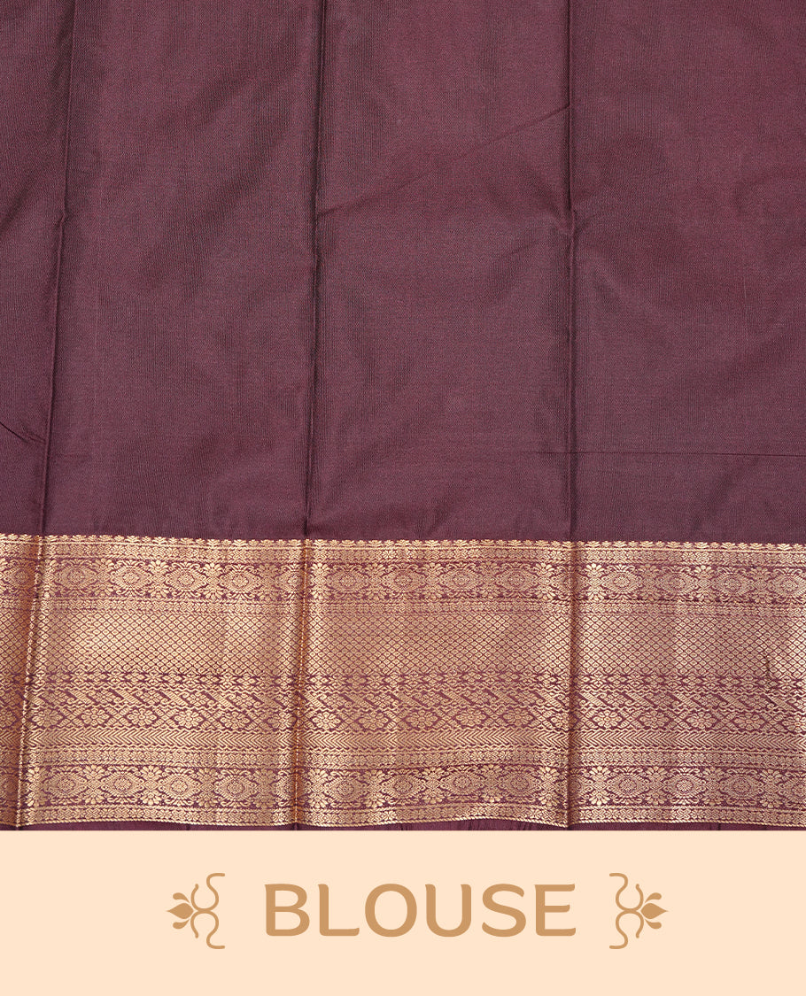 Dark chocolate colour Semi silk saree Featuring gold zari motifs on body, complemented by Self colour with gold zari border, paired with matching blouse piece.