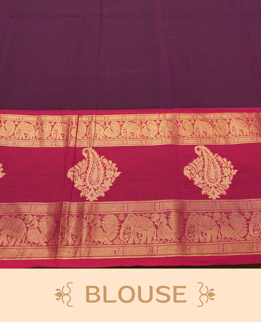 Maroon Colour silk cotton saree with gold zari elephant and floral design on the border, contrast pallu with traditional motifs, and a coordinated maroon blouse carrying the same rich zari border.