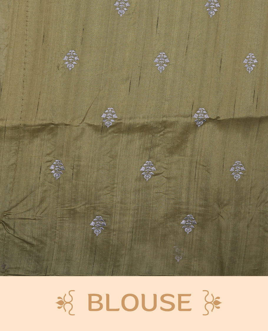 Green colour semi tusser silk saree featuring Floral thread embroidery across body, without border and paired with matching blouse.