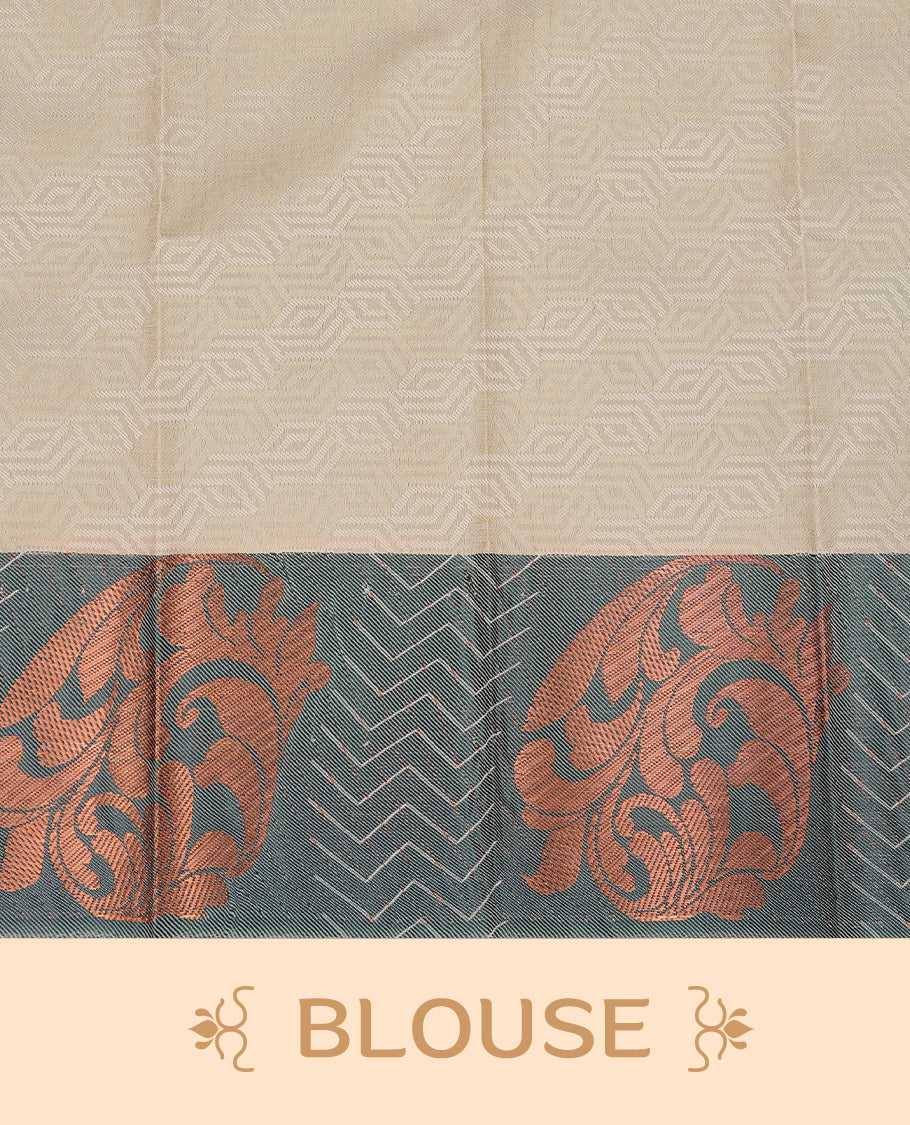 Light khaki colour Semi silk saree Featuring self colour zari Pattern on body, complemented by contrast Green colour with Antique zari border, paired with matching blouse piece.
