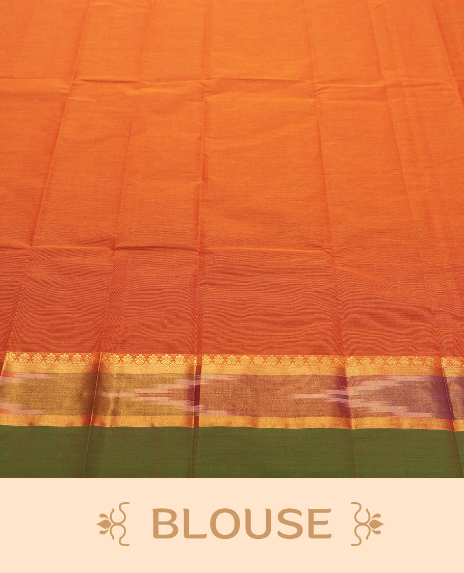 Burnt Orange colour Silk Cotton Saree with Contrast Green Zari Border featuring Ikat-inspired floral panels, Small Dual-Tone Buttas on the Body, Paisley-Woven Pallu, and a Coordinated Matching Blouse Piece