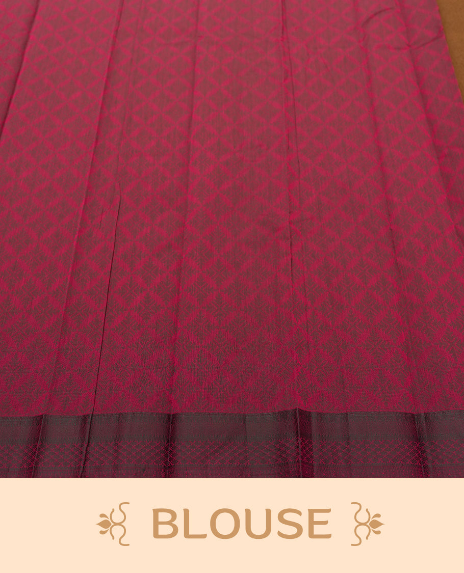Wine berry colour silk cotton saree featuring elegant floral zari motifs on the body, complemented by a rich contrast dark border and pallu with traditional woven detailing & Comes with a matching blouse piece.