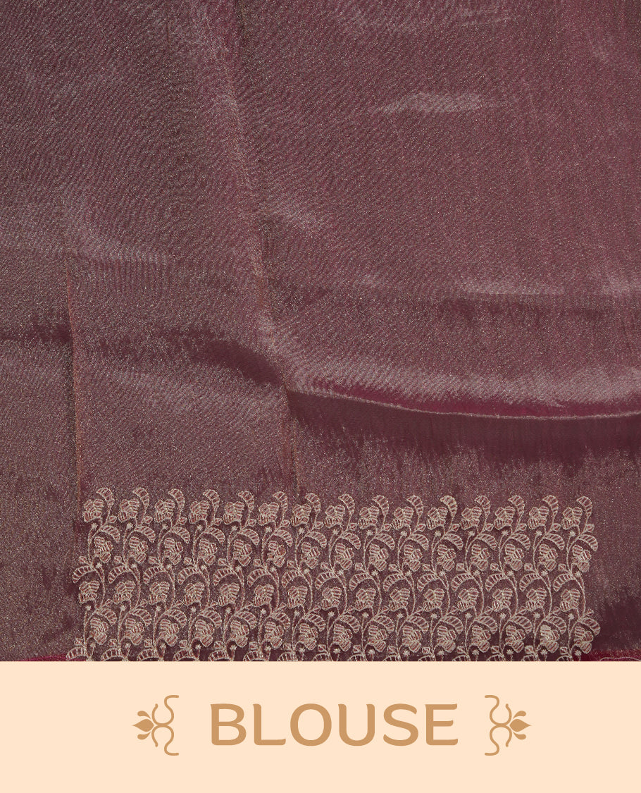 Pastel Mulberry colour net organza saree featuring white thread embroidery motifs on body and thread detailing on the border and paired matching blouse.