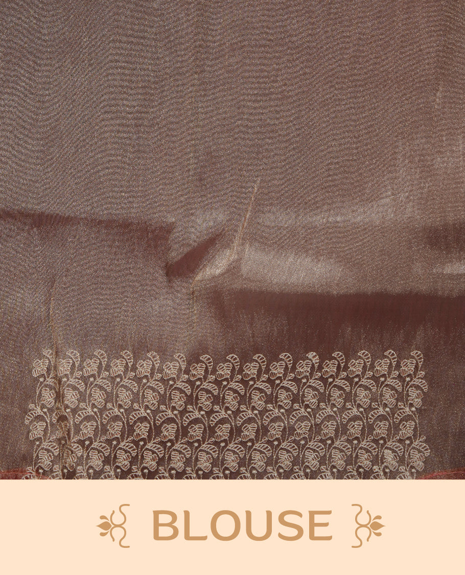 Pastel peach colour organza saree featuring white thread embroidery motifs on body and thread detailing on the border and paired matching blouse.