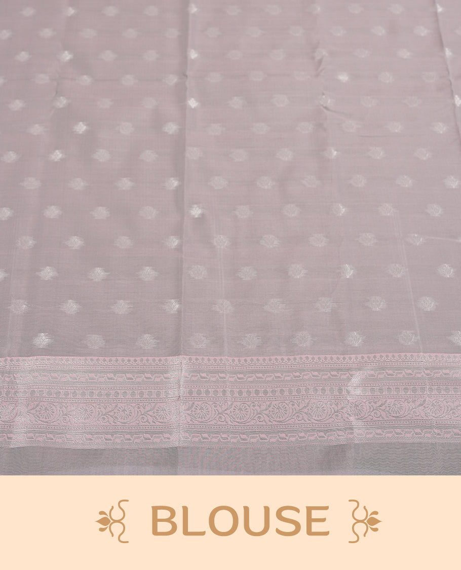 Aqua blue colour semi silk saree adorned with silver zari designs on the body, complemented by a contrasting Aqua blue border and pallu, and paired with a matching blouse piece