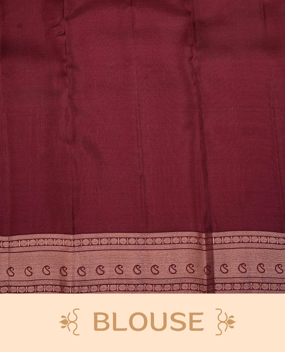 Dark Orange Colour Traditional Kancheepuram Slik Saree Featuring Gold Zari Mango Motifs on the Body, Complemented by a Contrast Maroon Colour Gold Zari Traditional Border and Pallu, Paired with a Matching Blouse .