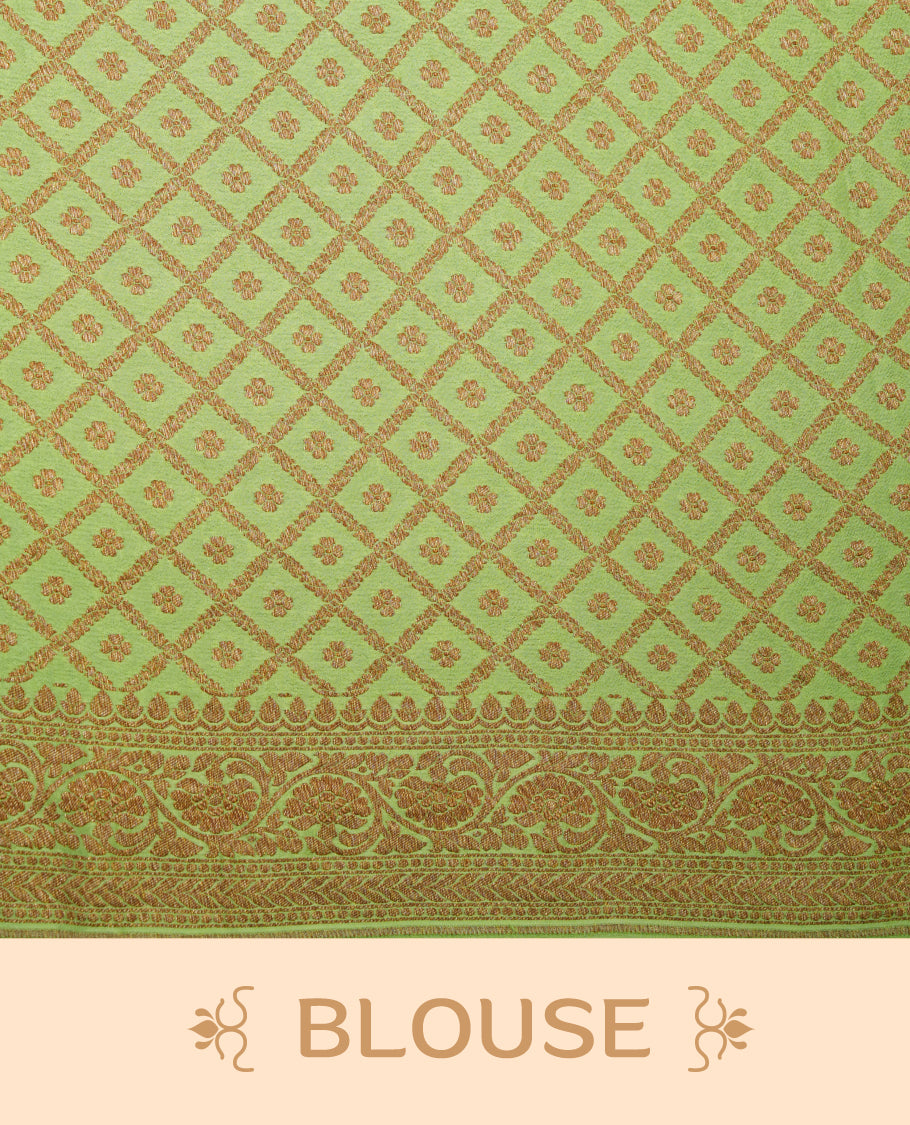 Dark Green colour pure Banarasi georgette saree featuring gold zari Flower Motifs all over the body, complemented by an contrast Light green dye colour with gold zari Floral Kodi Worked border and pallu, with matching blouse.