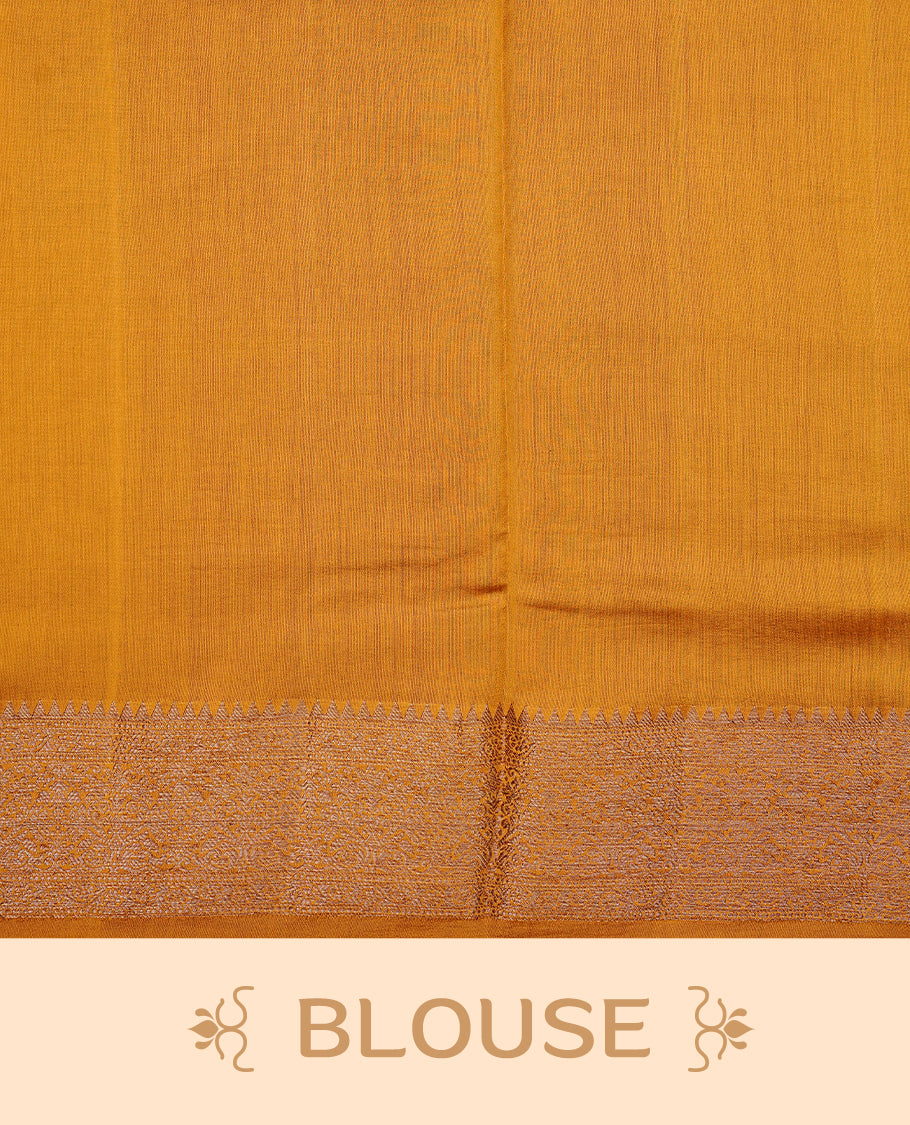 Mustard Colour Pure Banaras Soft Silk saree featuring Antique Zari buttas in body, complemented by zari work on self colour border, paired with matching Blouse Piece.