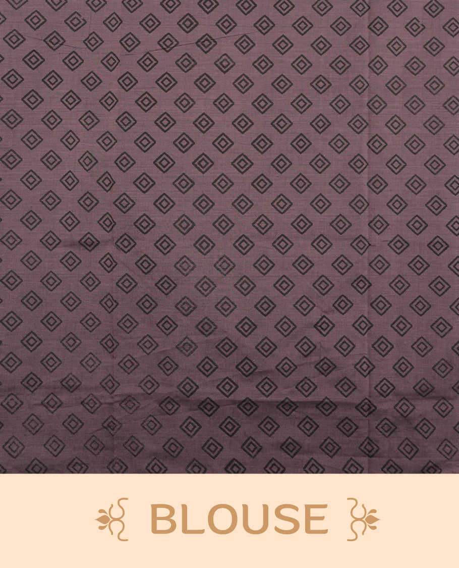 Black and Onion mix colour poly cotton saree with black temple motifs on the body, paired with a matching with black woven traditional border, and a coordinated all‑over geometric printed blouse piece.