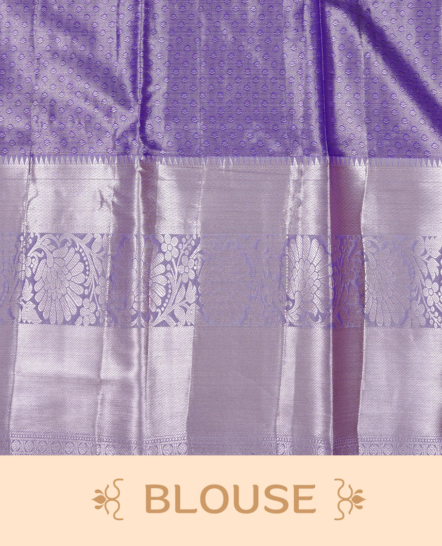 Light purple colour tissue saree featuring rose gold zari floral kodi pattern on the body, highlighted by a self colour border with rose gold traditional zari, paired with a matching blouse piece.