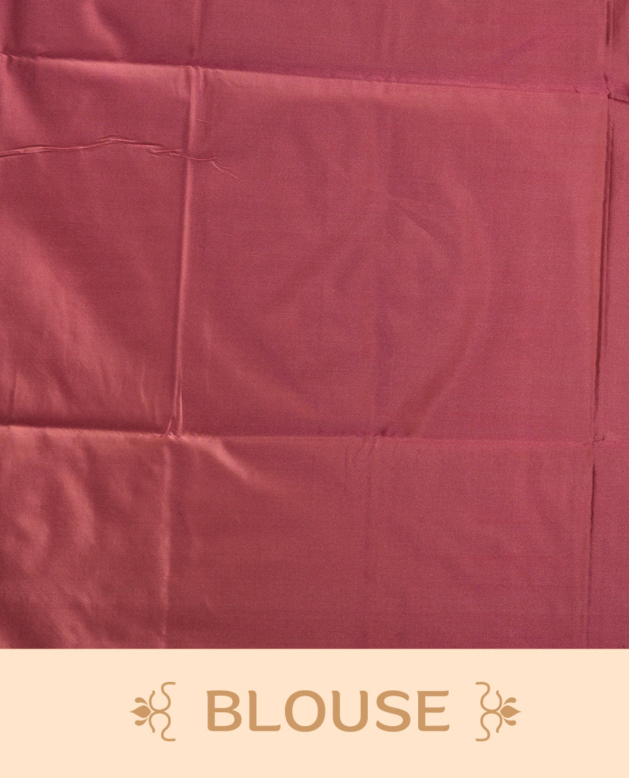 Cherry pink colour semi soft silk saree, adorned with subtle woven mango motifs on the body & The design is elevated with an elegant zari border and pallu, paired with a matching blouse.