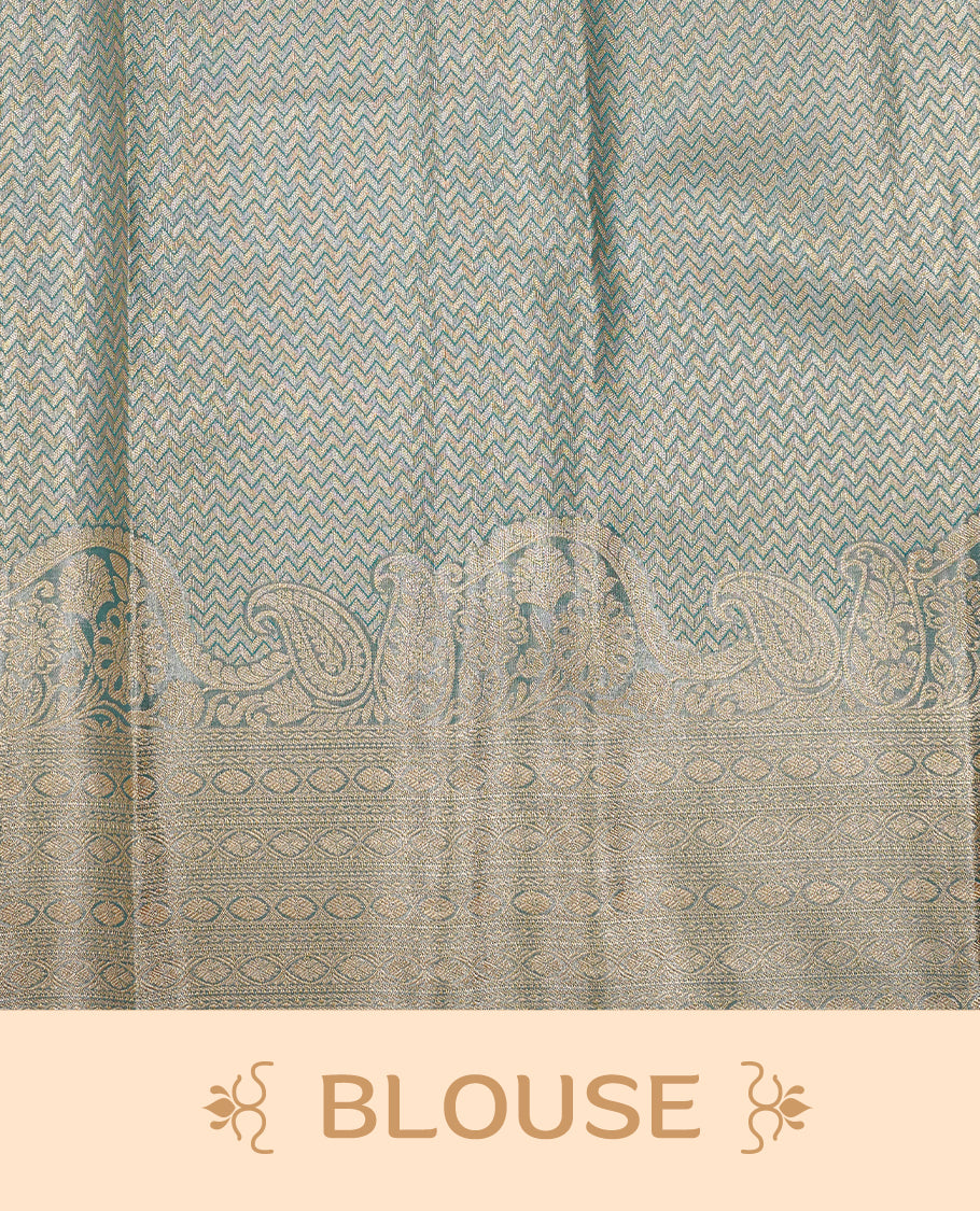 Light Pink colour Tissue silk saree featuring Gold zari Floral kodi design on body, enhance with Aqua colour with traditional zari border, paired with matching blouse piece.