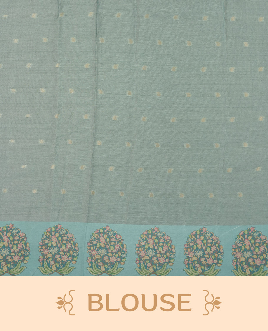 cream beige colour semi tussar saree adorned with gold zari motifs across the body and Floral pattern contrast Light blue colour on border, paired with a matching blouse.