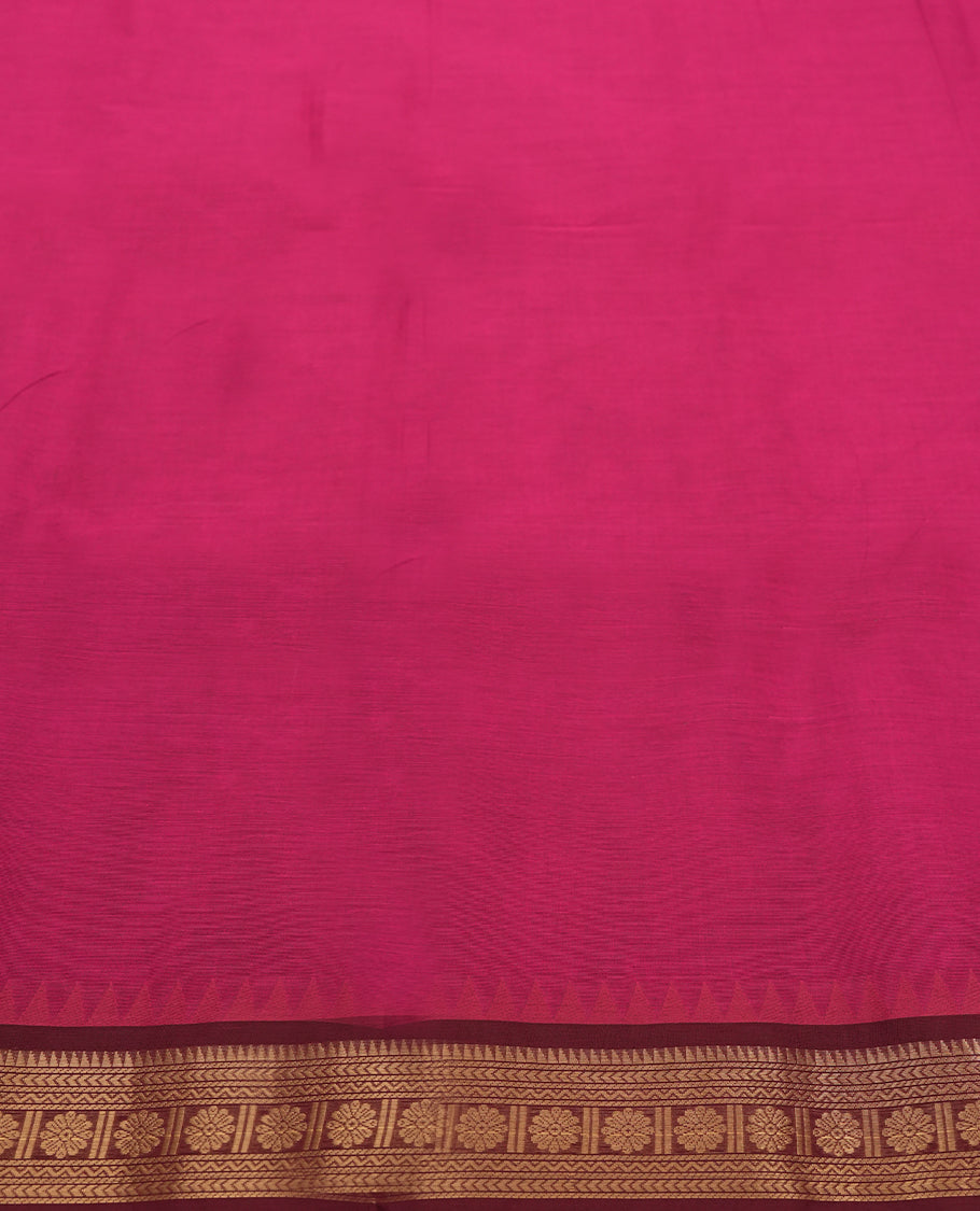 Magenta Chettinad cotton saree featuring a traditional gold zari maroon colour border with intricate temple motifs, soft texture, and elegant finish & Comes with a matching blouse for a classic ethnic look.