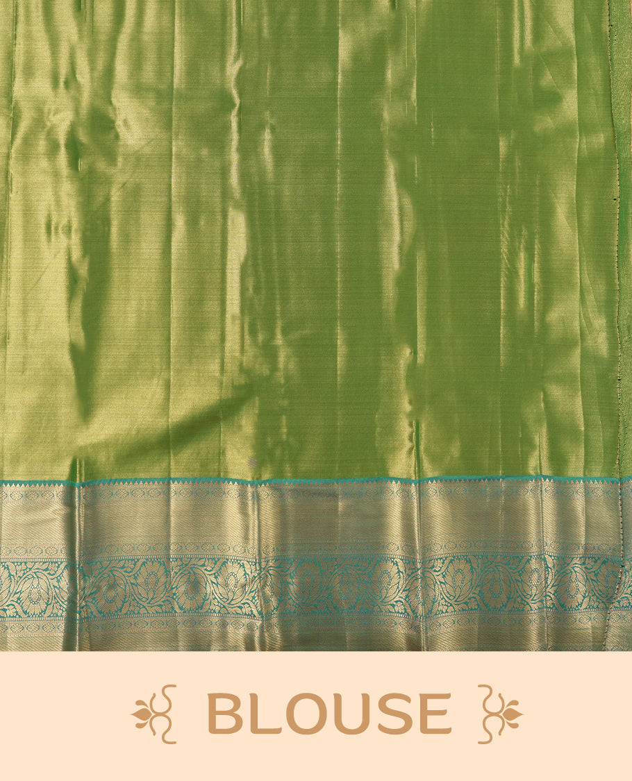 Light green colour and silver Zari Tissue Brocade Saree features intricate Dimond floral Motifs on body and dark green colour contrast with traditional border & pallu, paired with matching blouse