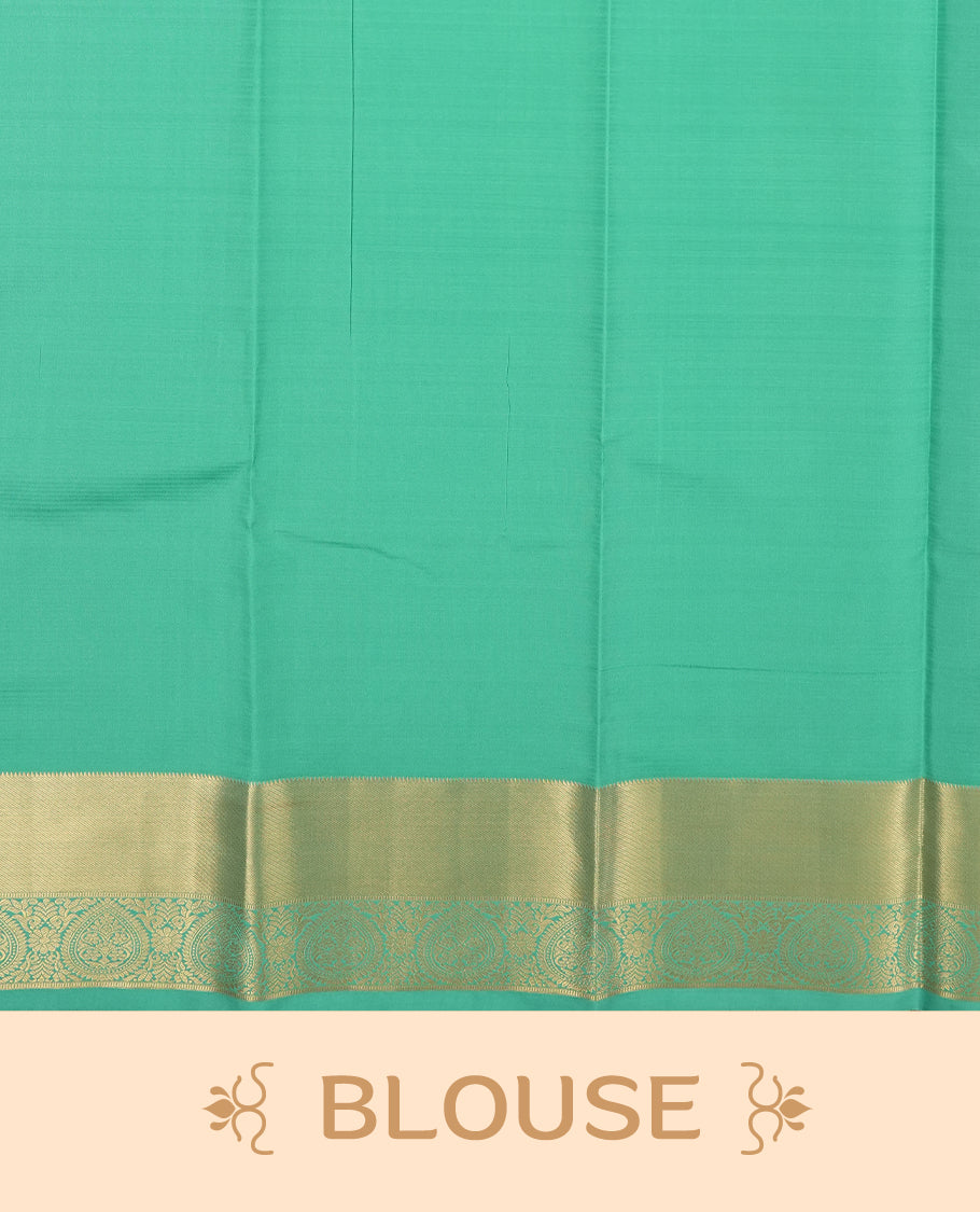 Very Dark purple colour semi soft silk saree featuring a gold coloured textured patterned body, complemented by contrast green with golden zari motifes on pallu & border and a matching blouse piece.