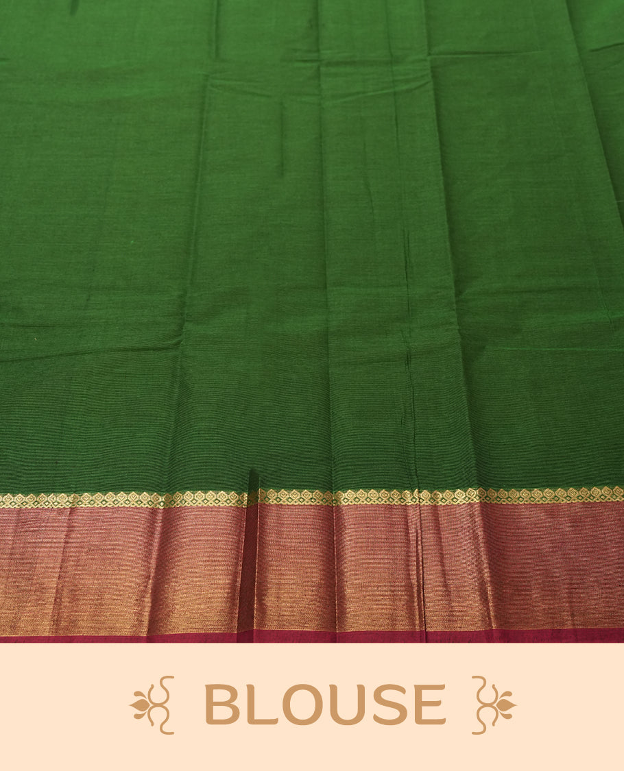 Emerald Green colour Silk Cotton Saree with Dual-Tone Zari Butta Motifs on the Body, Contrasting Antique Gold Tissue Border Accented with Maroon Selvedge, and a Coordinated Matching Blouse Piece
