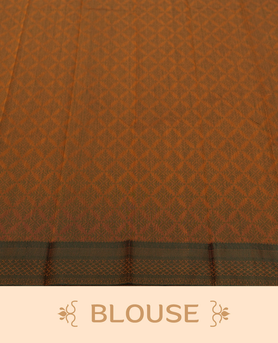 Deep mustard colour silk cotton saree featuring subtle elegant floral woven motifs on the body, complemented by a classic contrast border and pallu with intricate traditional detailing & Comes with a matching blouse piece.