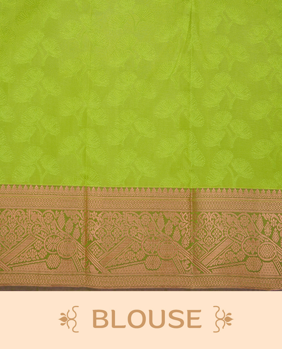 Pastel Green colour Semi silk saree Featuring selfcolour zari pattern on body, complemented by contrast Dusty purple colour with gold zari border, paired with matching blouse piece.