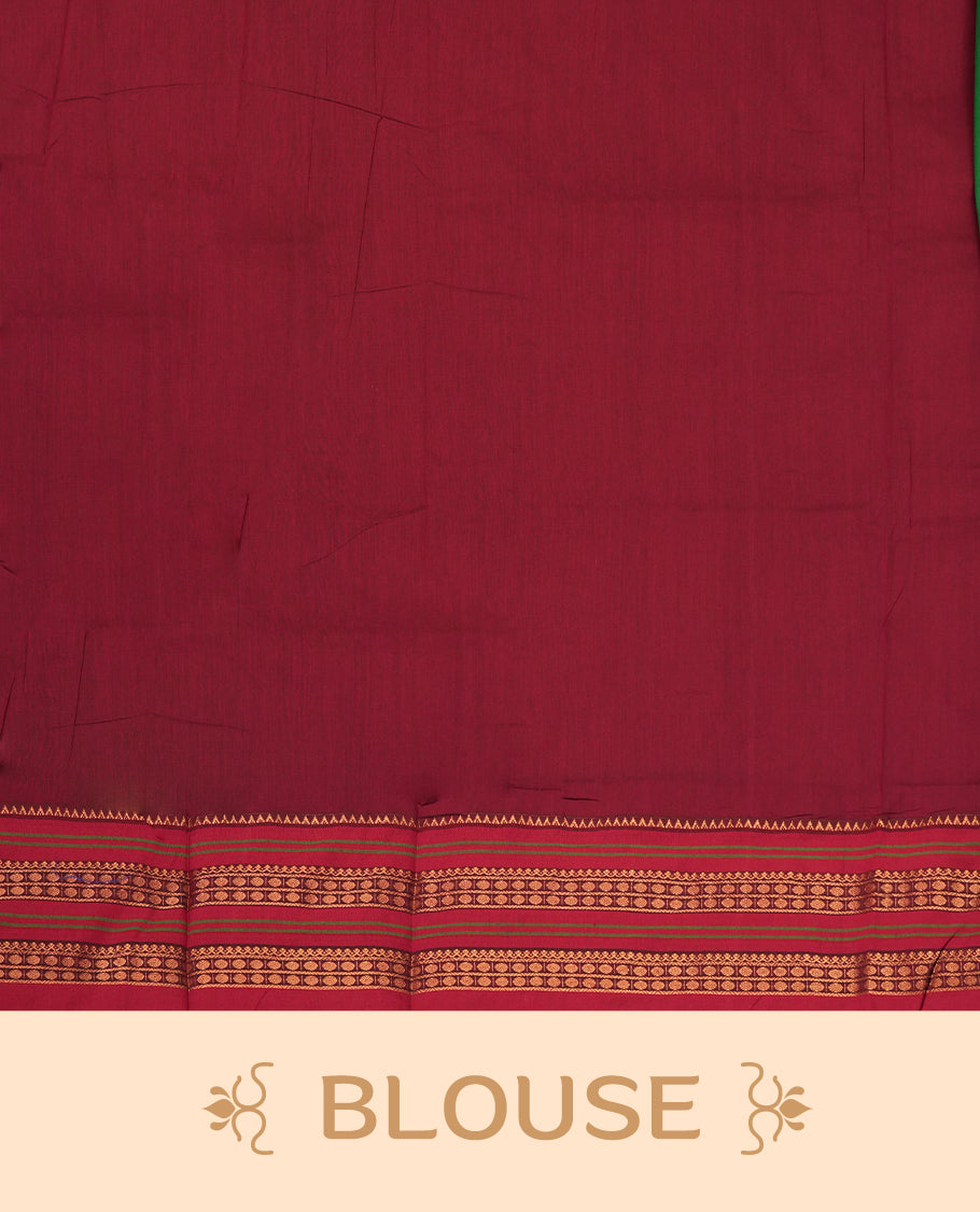 Royal green colour Kalyani cotton saree with contrast maroon border adorned with intricate golden zari weaving & Paired with matching blouse.