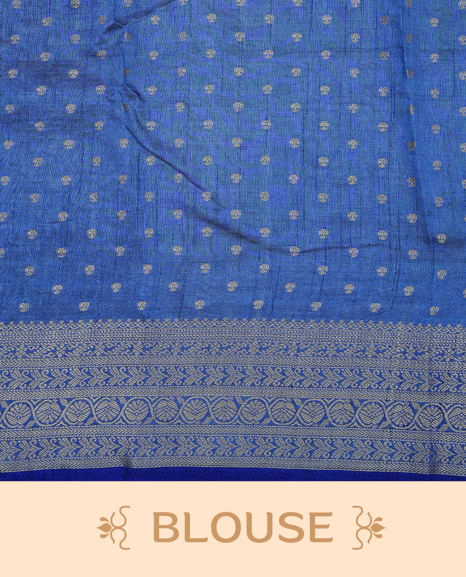 Cream colour Semi Tussar silk saree featuring an Gold zari motifs on body, accentuated by a contrast Blue border adorned with intricate gold zari work, paired with a matching blouse piece.