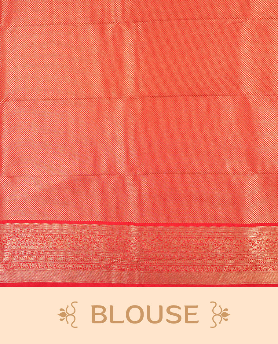 Red colour semi silk brocade saree featuring intricate Gold butta patterns across the body, complemented by a rich self colour woven border and pallu, paired with a matching blouse.