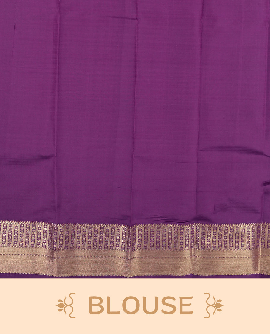 Twilight lavender colour semi soft silk saree featuring a golden textured patterned body, complemented by contrast purple with golden motifes on pallu & border and a matching blouse piece.