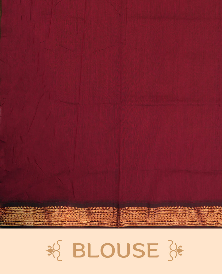 Deep forest green colour Kalyani Cotton saree with rich maroon border and pallu, featuring copper zari peacock motifs and intricate weaving & Includes a matching blouse piece.
