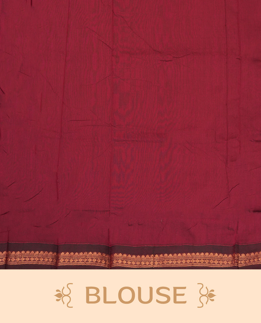 Green colour Kalyani Cotton saree with golden motifs, paired with a contrasting maroon border featuring intricate zari work & Comes with a matching blouse piece.