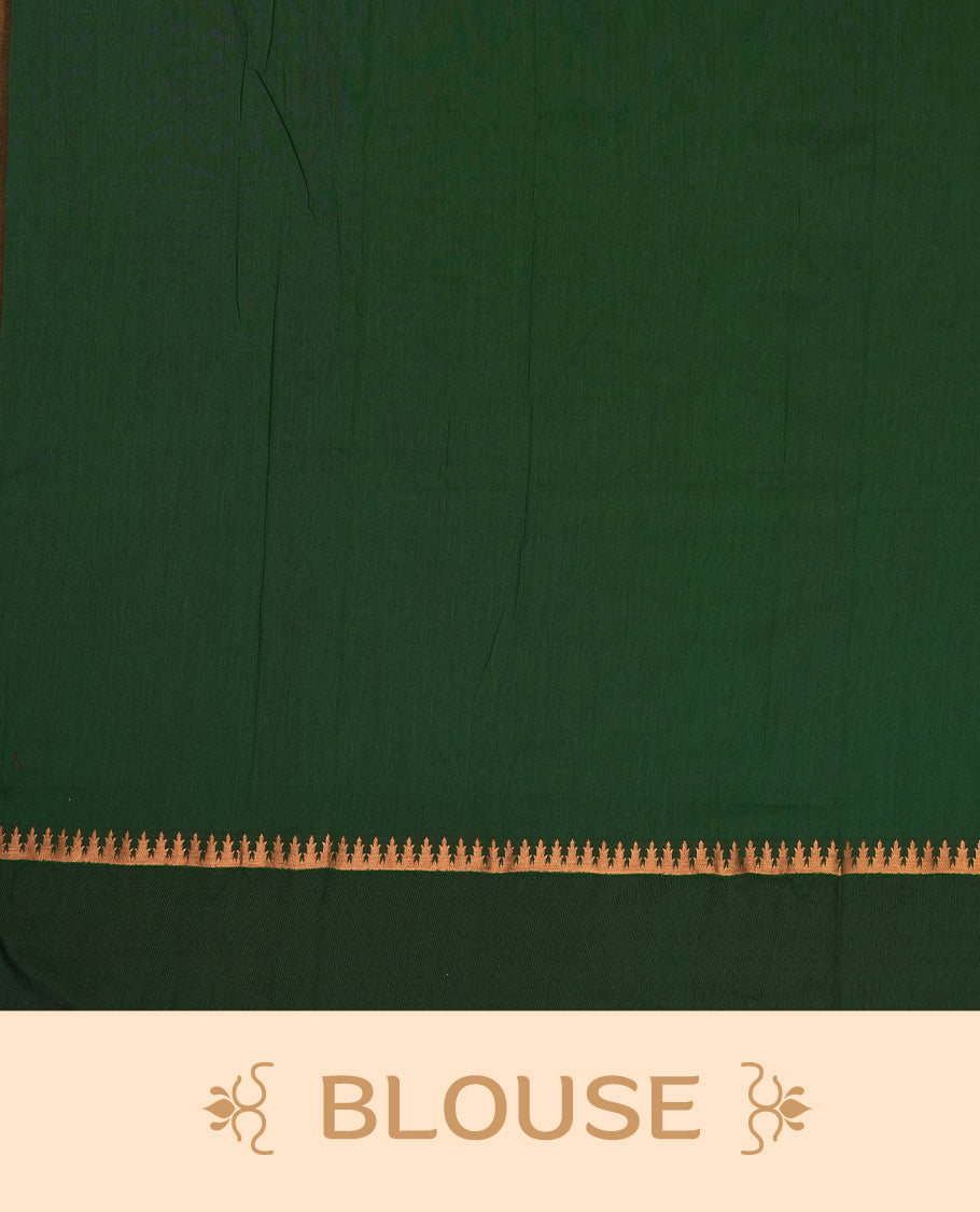 Purple colour Kalayani cotton saree featuring majestic copper zari elephant motifs on the body, paired with a contrasting green border and pallu adorned in intricate traditional designs with matching blouse
